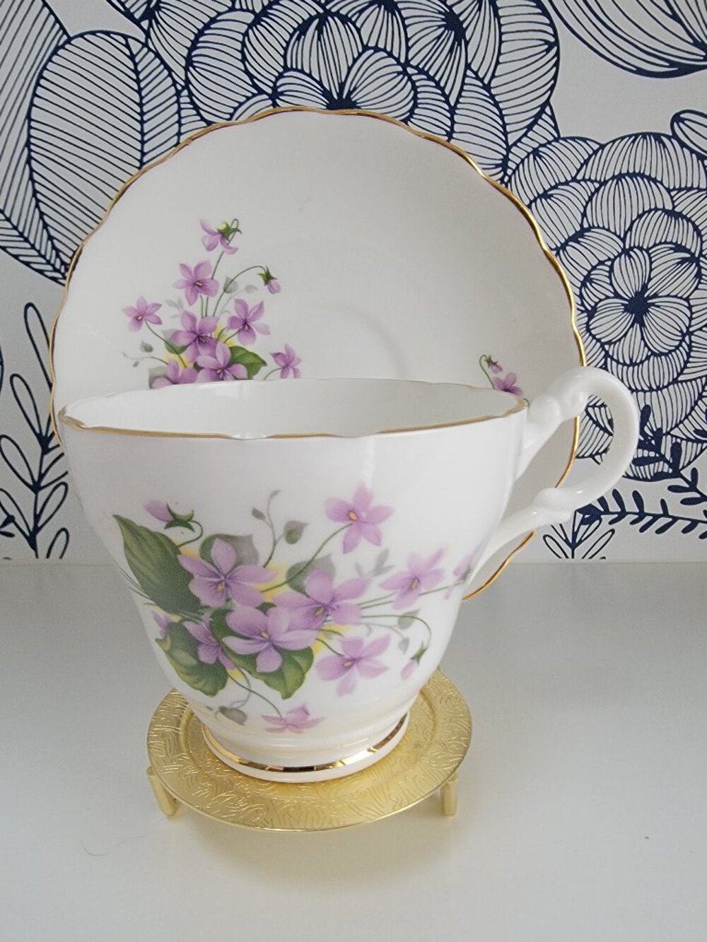 Consort teacup & saucer with soft purple violets, gold trim, scalloped rim
